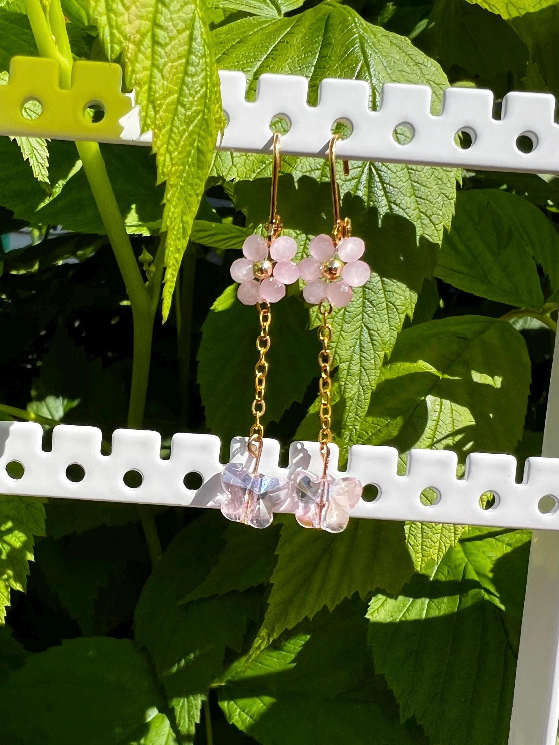Daisy pink crystal earrings with butterfly