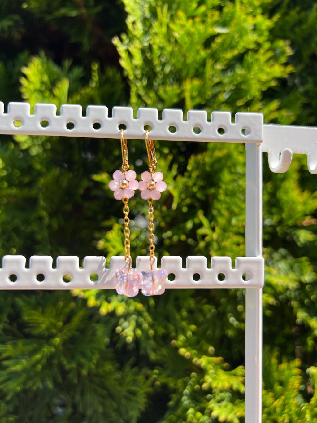 Daisy pink crystal earrings with butterfly