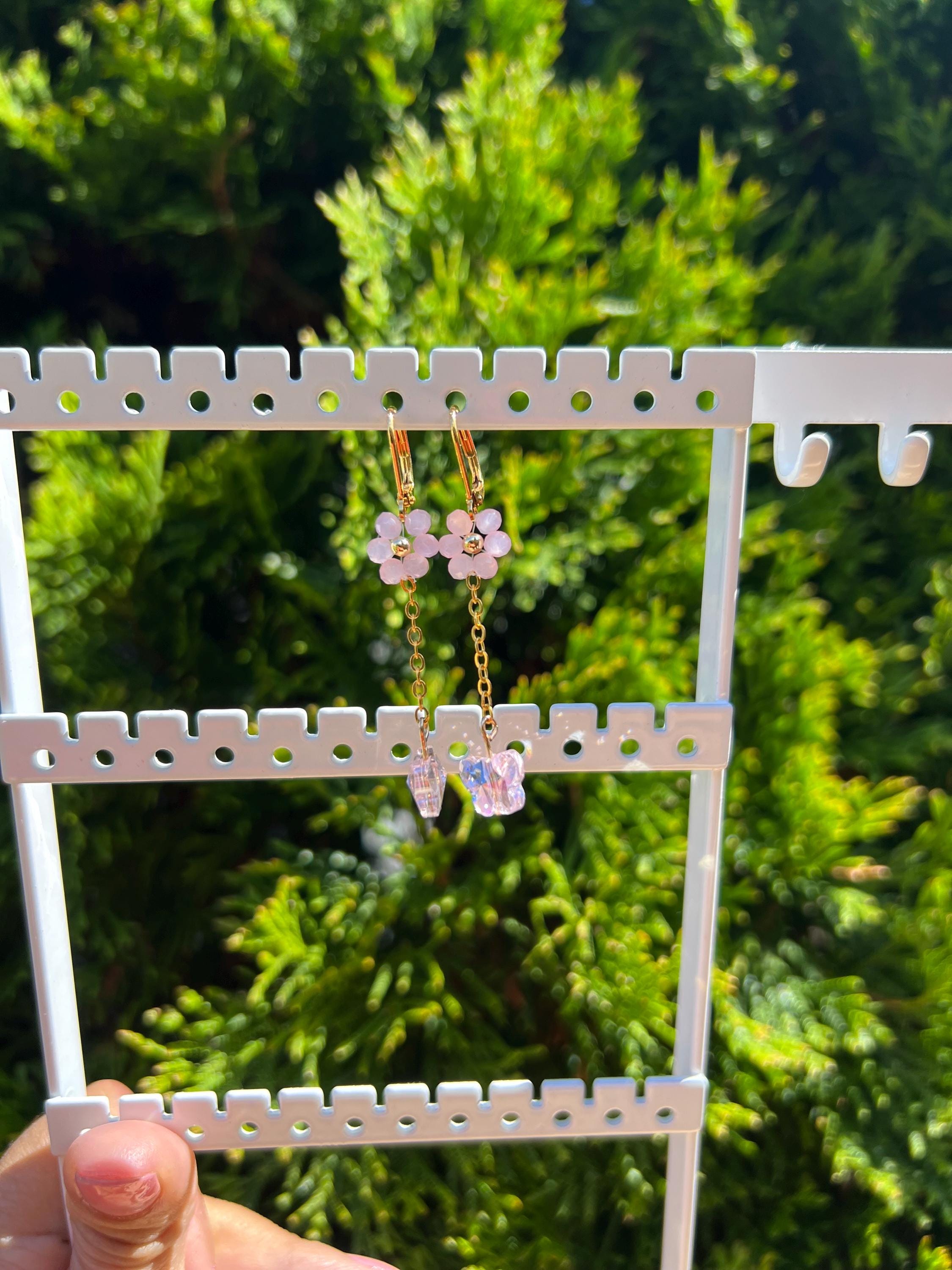 Daisy pink crystal earrings with butterfly