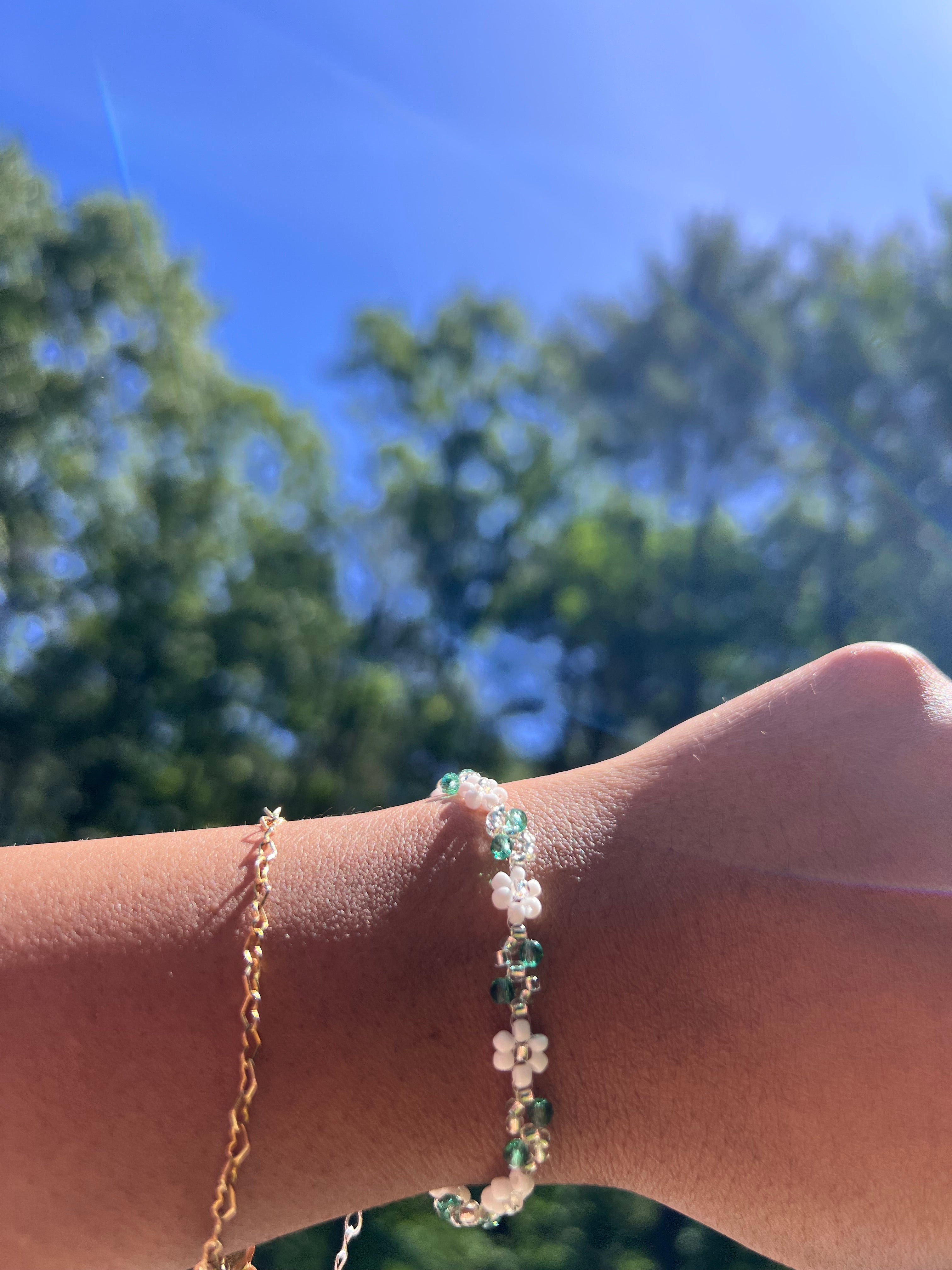 White daisy with silver and teal accent bracelet