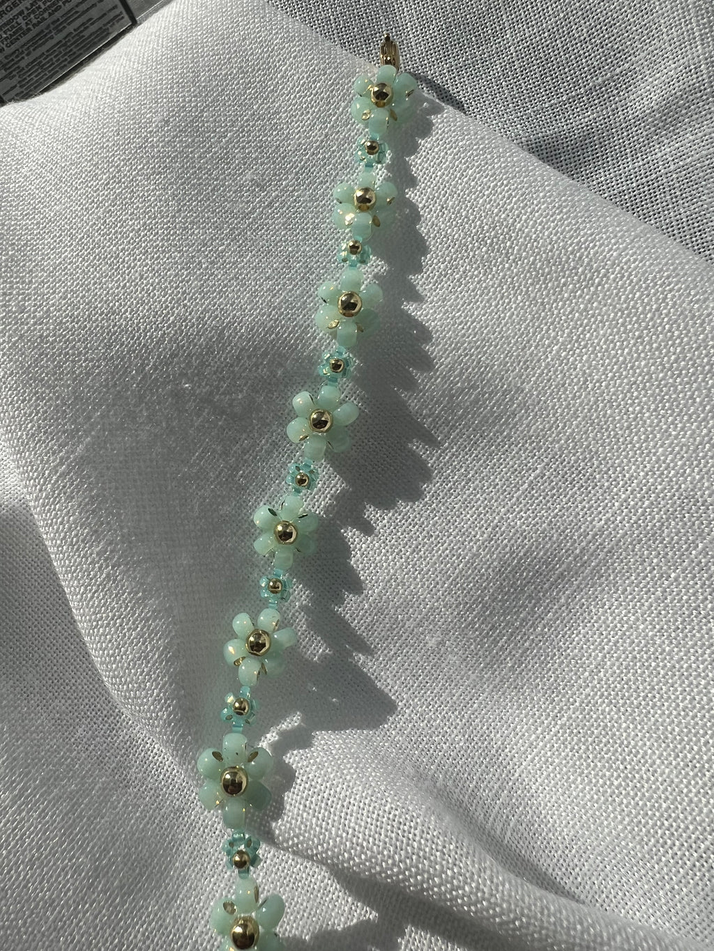 Teal daisy bracelet