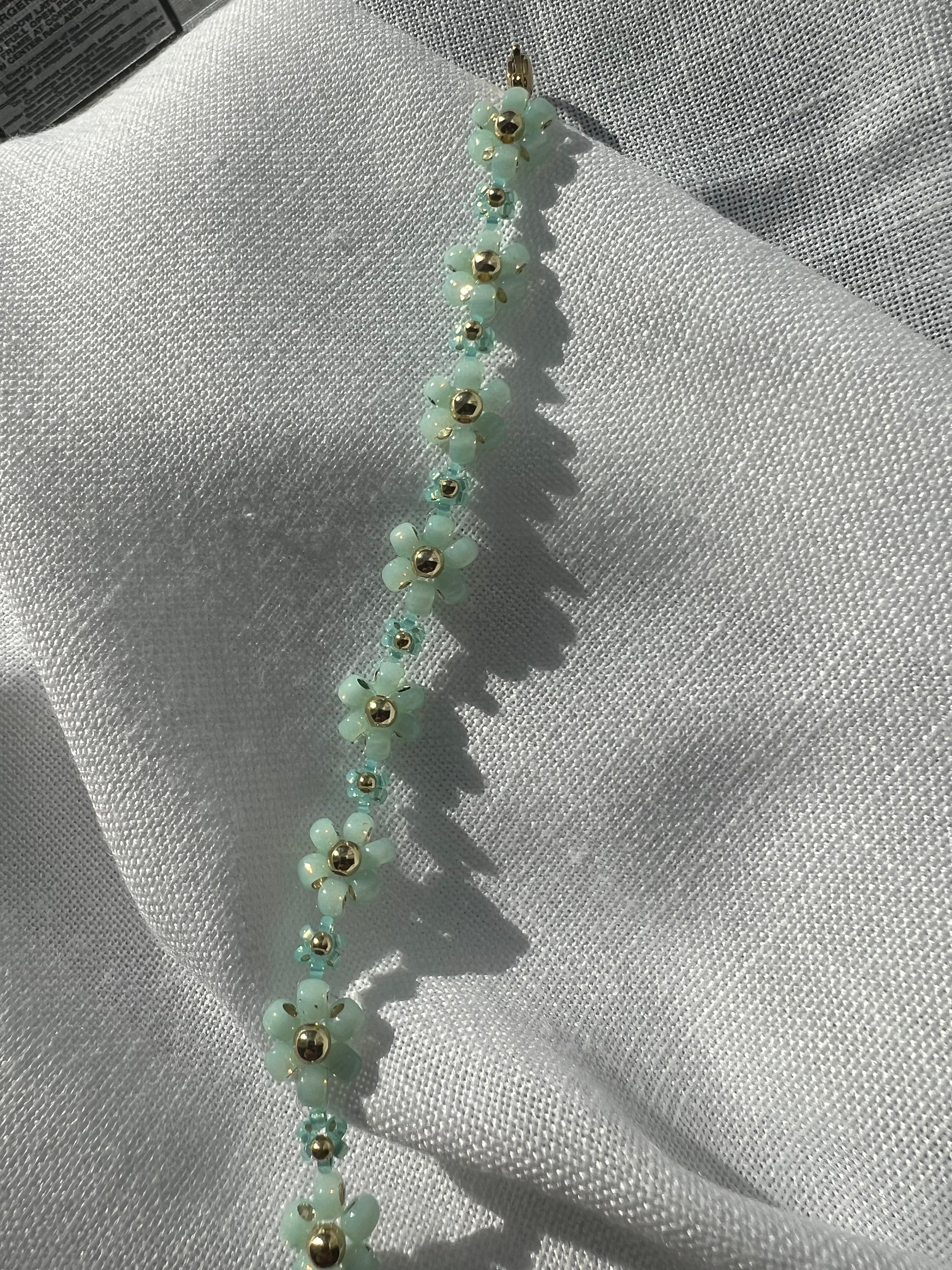 Teal daisy bracelet
