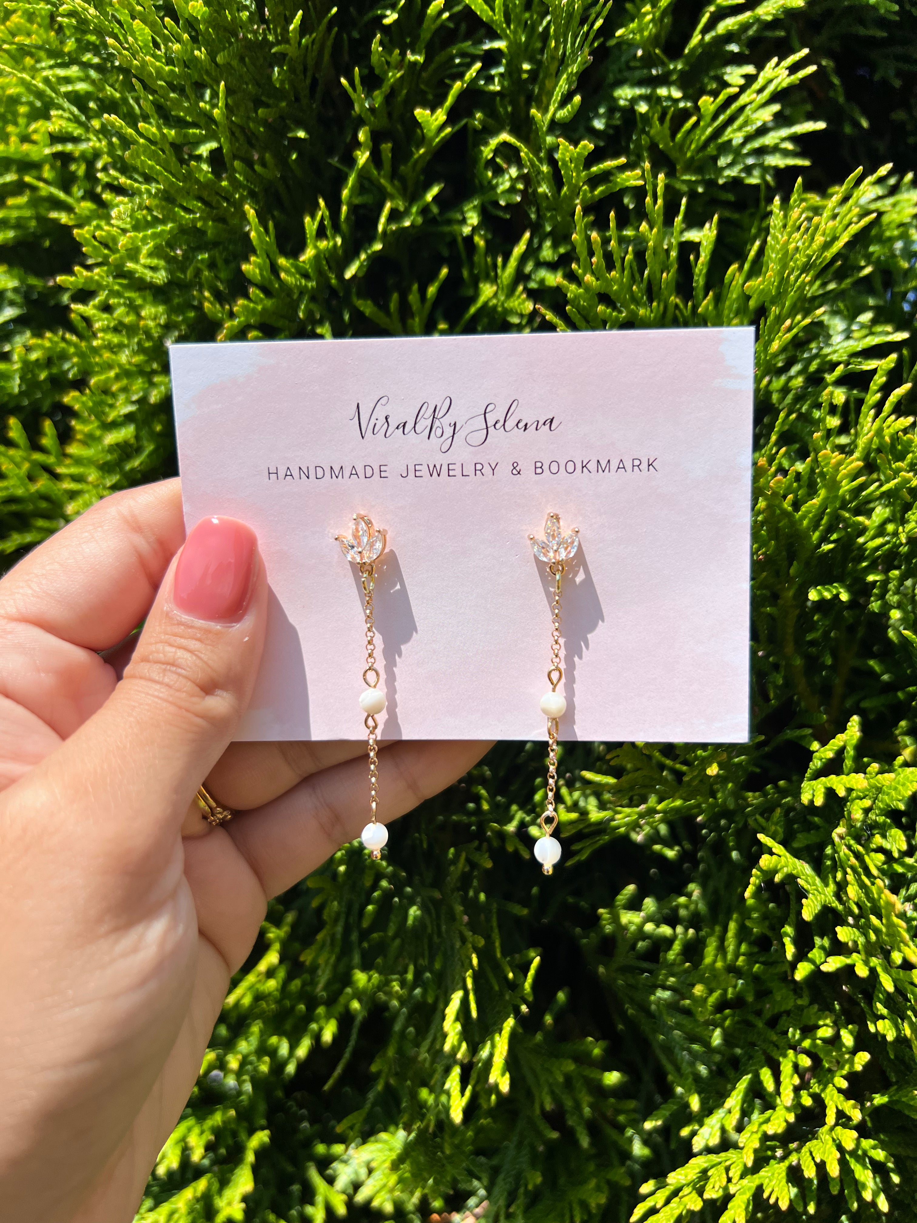 Mother of pearl earring with cubic zirconia studs