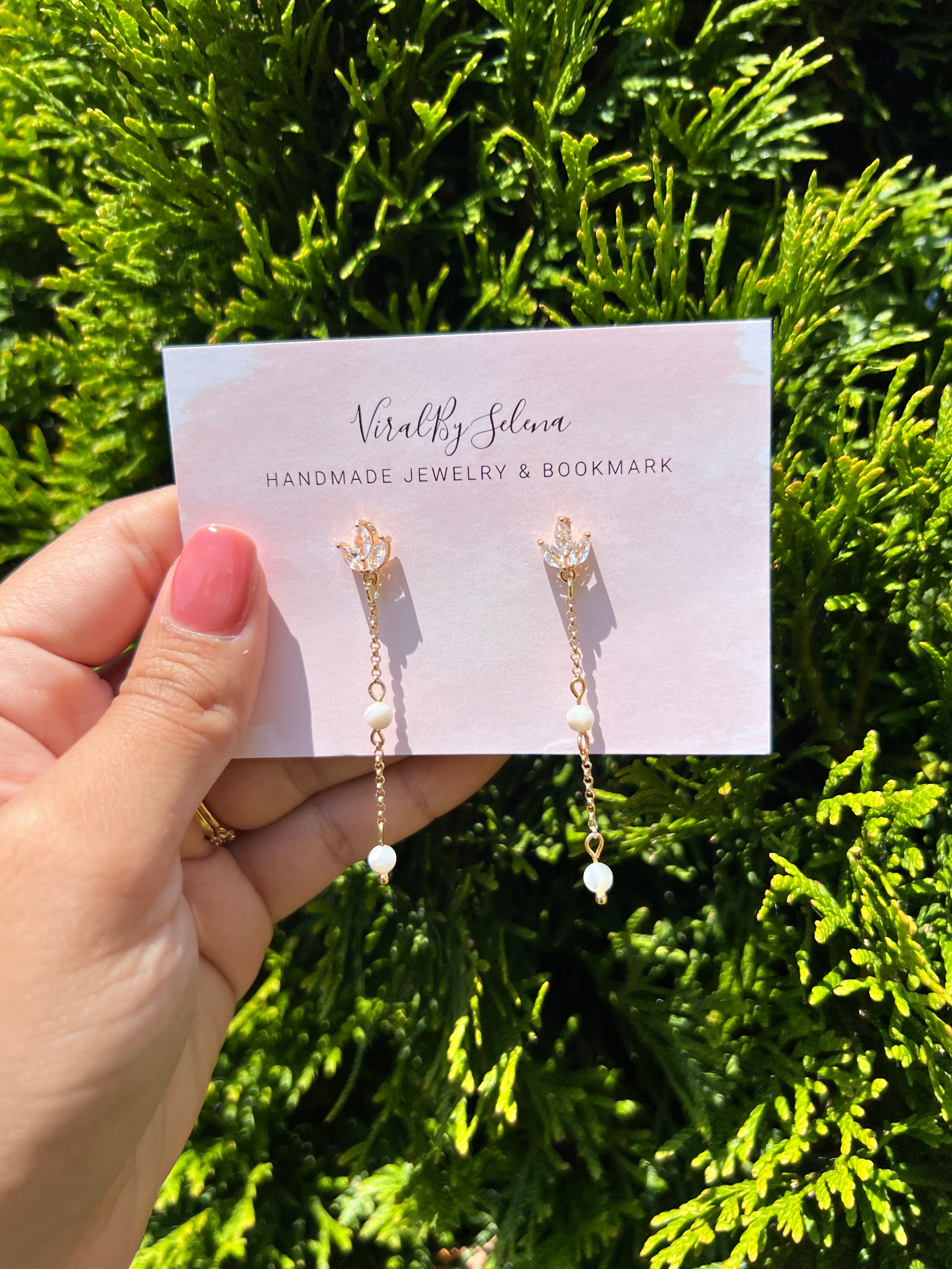 Mother of pearl earring with cubic zirconia studs