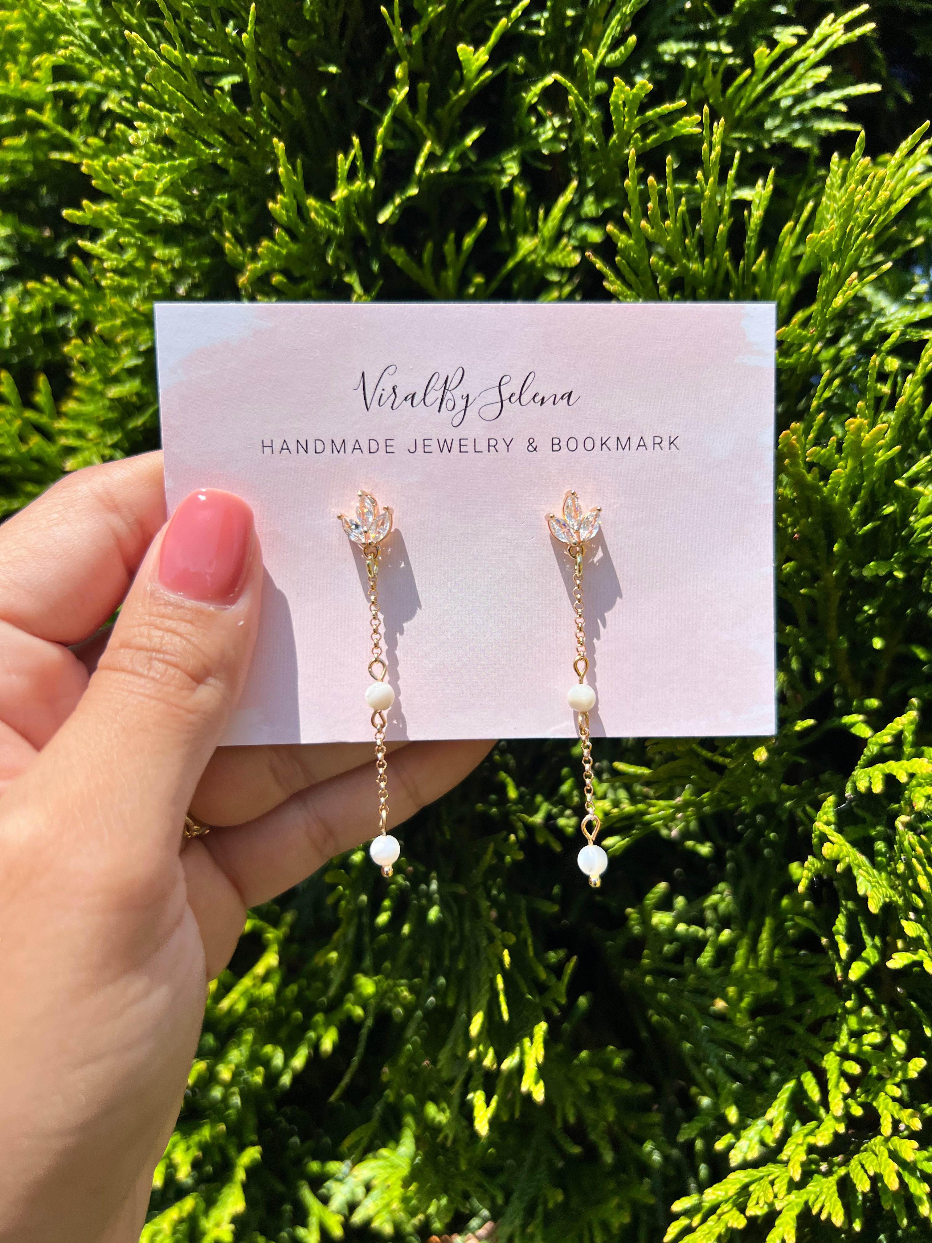 Mother of pearl earring with cubic zirconia studs