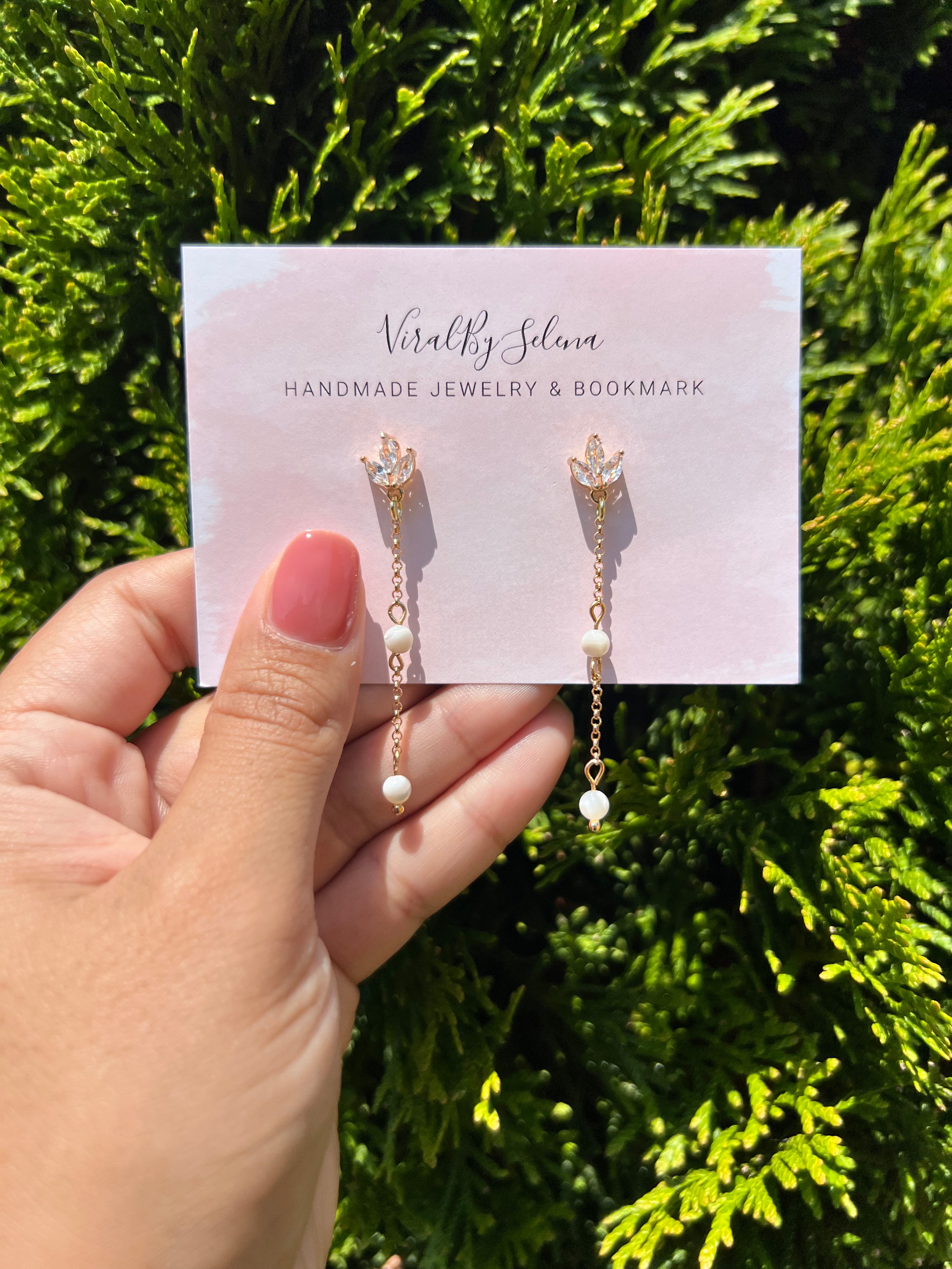 Mother of pearl earring with cubic zirconia studs