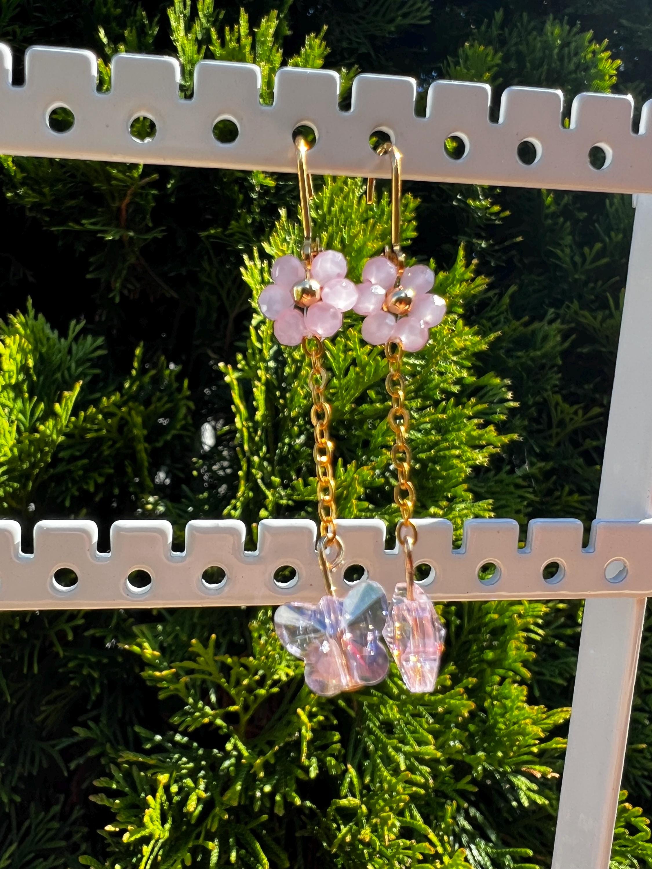 Daisy pink crystal earrings with butterfly